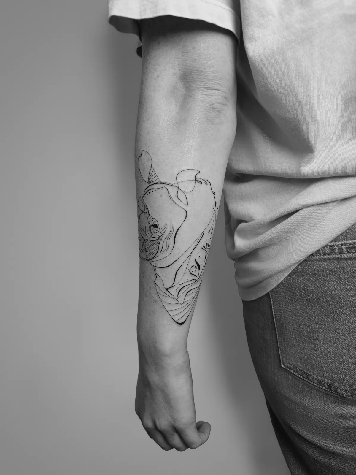 Fine-Line Rhino Forearm — tattoo view