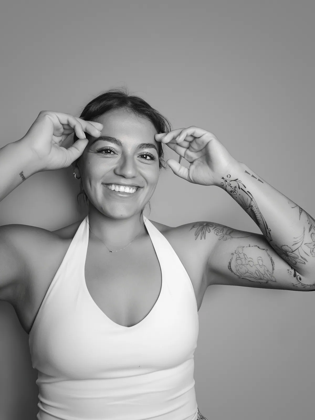 Studio portrait of a woman wearing her tattoos, photograph 16 of 16